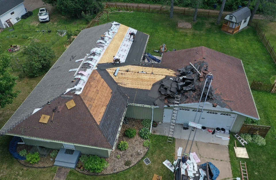 Half complete roof showing the plywood