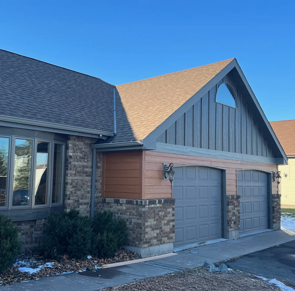 house with brick and siding